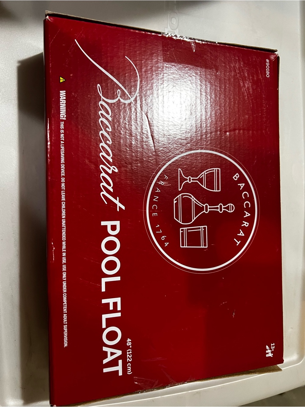 Baccarat Red Branded Pool Float Packaging